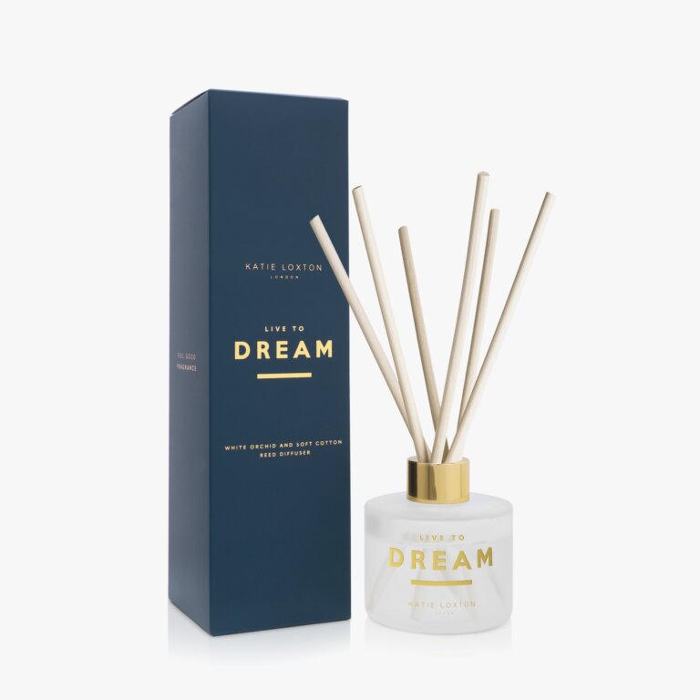 Gold Katie Loxton 'Live to Dream' Sentiment Reed Diffuser in the scent White Orchid and Soft Cotton. Finished with beautiful Navy Packaging.