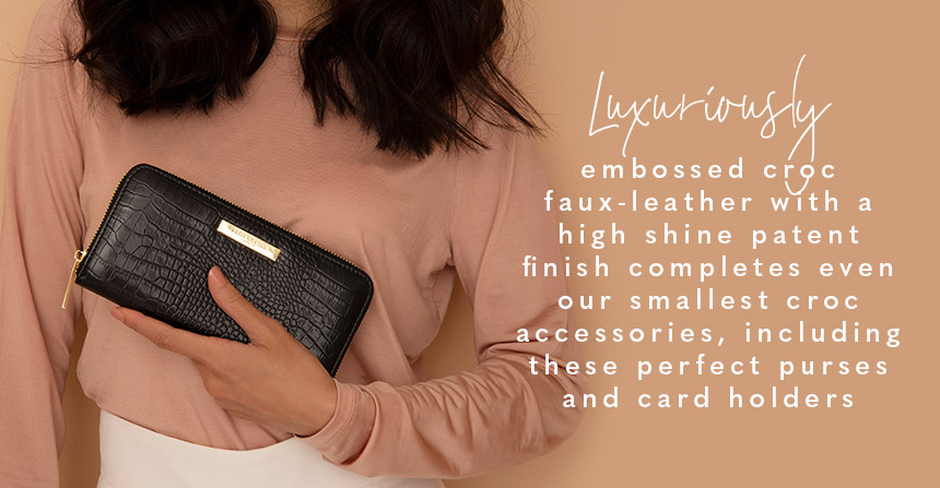 Luxuriously embossed croc faux-leather with a high shine patent finish completes even our smallest croc accessories, including these perfect purses and card holders