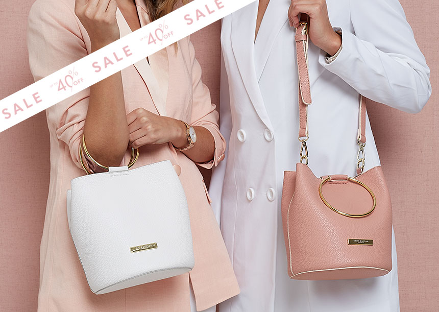 Suki mini bucket bag in white and pink. Sale items.